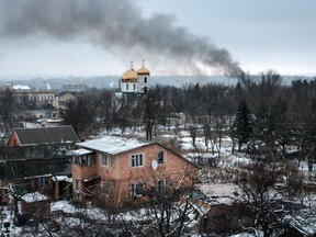 Smoke rises after shelling in Bakhmut Photographer: Yasuyoshi Chiba/Getty Images