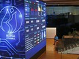 A trader talks on his phone inside the trading room of the Borsa Stock Exchange in Istanbul Turkey, June 25, 2018.