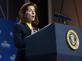 FILE - Commerce Secretary Gina Raimondo speaks before President Joe Biden to African leaders gathered for the U.S.-Africa Leaders Summit Dec. 14, 2022, in Washington. The government's $52 billion investment to develop advanced computer chips has become a rare source of bipartisan agreement. Senate Republican leader Mitch McConnell voted for it because of its importance for national security. But Raimondo says the U.S. needs a whole-of-society effort for the investments to succeed.