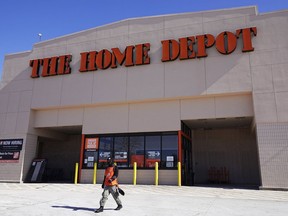 FILE - A view of the exterior of the Home Depot improvement store, in Niles, Ill., Saturday, Feb. 19, 2022. Home Depot says it's investing $1 billion in wage increases for its U.S. and Canadian hourly workers. The Atlanta-based home improvement chain said Tuesday, Feb. 21, 2023 that every hourly employee will get a raise starting this month. The investment will also ensure that starting pay is at least $15 per hour in all markets.