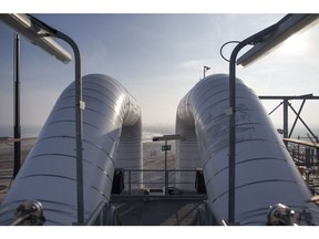Pipework stands on top of a storage silo as construction work continues at the liquid natural gas (LNG) terminal, a unit of Electricite de France (EDF) SA, in Dunkirk, France. Photographer: Jasper Juinen/Bloomberg
