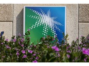 The logo of the Saudi Aramco oil company sits on display outside the Research and Development center at the company's compound in Dhahran, Saudi Arabia, on Wednesday, Oct. 3, 2018. Speculation is rising over whether Saudi Arabia will break with decades-old policy by using oil as a political weapon, as it vowed to hit back against any punitive measures after the disappearance of government critic Jamal Khashoggi. Photographer: Simon Dawson/Bloomberg