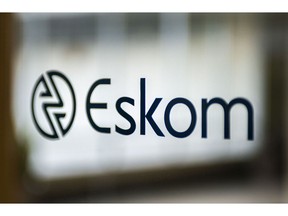 A company logo is displayed during a news conference to announce the Eskom Holdings SOC Ltd. full year results at their headquarters in Johannesburg, South Africa, on Tuesday, July 30, 2019. Eskom reported a record loss of 20.7 billion rand.