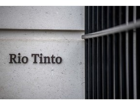 A sign sits on a wall near the entrance to the Rio Tinto Plc offices in London, U.K., on Tuesday, March 10, 2020. While the U.K. authorities have abandoned efforts to contain the coronavirus, focusing on delaying the worst of the outbreak, financial-services companies are grappling with policy as several offices cope with health scares. Photographer: Chris J. Ratcliffe/Bloomberg