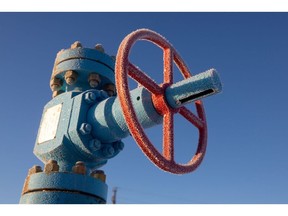 A valve control wheel connected to crude oil pipework in an oilfield near Dyurtyuli, in the Republic of Bashkortostan, Russia, on Thursday, Nov. 19, 2020. The flaring coronavirus outbreak will be a key issue for OPEC+ when it meets at the end of the month to decide on whether to delay a planned easing of cuts early next year. Photographer: Andrey Rudakov/Bloomberg