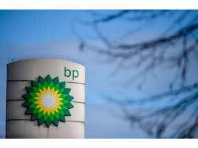 A BP logo on totem sign at a BP Plc petrol station on the side of the North Circular road in London, U.K., on Tuesday, Feb. 2, 2021. BP Plc showed that Big Oil has barely begun to heal the wounds from last year's historic slump, posting earnings that fell short of expectations on weak fuel sales, refining margins and gas trading. Photographer: Chris J. Ratcliffe/Bloomberg