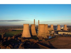 Cooling towers at Electricite de France SA's (EDF) coal-fired power station in West Burton, U.K., on Thursday, Dec. 2, 2021. The recent drop in prices for coal and U.S. gas, as well as limited interest for LNG cargoes from some buyers in Asia, opened the way for added supply into Europe.