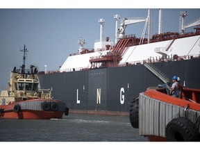 Tug boats prepare to pull out an LNG Tanker vessel at the Cheniere Sabine Pass Liquefaction facility in Cameron, Louisiana, U.S., on Thursday, April 14, 2022. Cheniere Energy, Inc. is the largest producer and exporter of liquefied natural gas (LNG) in the United States and the second-largest LNG operator in the world. Photographer: Mark Felix/Bloomberg