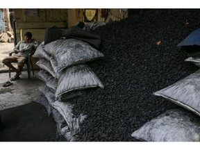 A stack of coal at a coal wholesale market in Mumbai, India, on Thursday, May 5, 2022. Production of coal, the fossil fuel that accounts for more than 70% of India's electricity generation, has failed to keep pace with unprecedented energy demand from the heat wave and the country's post-pandemic industrial revival. Photographer: Dhiraj Singh/Bloomberg