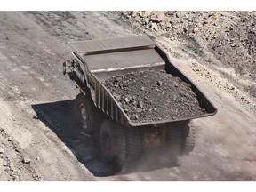 A dump truck transports excavated rock along an access road at the Mafube open-cast coal mine, operated by Exxaro Resources Ltd. and Thungela Resources Ltd., in Mpumalanga, South Africa on Friday, Sept. 9, 2022. South Africa relies on coal to generate more than 80% of its electricity, and has been subjected to intermittent outages since 2008 because state utility Eskom Holdings SOC Ltd. can't meet demand from its old and poorly maintained plants. Photographer: Waldo Swiegers/Bloomberg