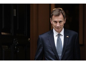 LONDON, ENGLAND - NOVEMBER 17: Chancellor of the Exchequer Jeremy Hunt departs Downing Street to present the Autumn Statement to the House of Commons on November 17, 2022 in London, England. The Chancellor hopes his fiscal plans will restore market confidence in the UK's economic outlook, as well as head off a cost-of-living crisis.