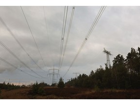 High voltage electricity power lines in Radeland, Germany, on Monday, Jan. 9 2023.The climate crisis has contributed to a lack of demand for heating so far this winter and increasingly volatile weather patterns may still trigger blasts of cold. Photographer: Krisztian Bocsi/Bloomberg
