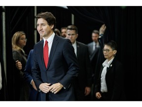 Justin Trudeau arrives at a news conference in a Toronto suburb on Monday.