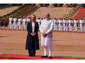 Giorgia Meloni, Italy's prime minister, left, and Narendra Modi, India's prime minister, during the ceremonial reception at the presidential palace in New Delhi, India, on Thursday, March 2, 2023. Meloni is on a two-day visit to India. Photographer: T. Narayan/Bloomberg