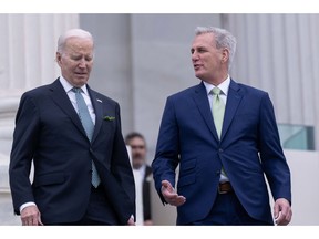 US President Joe Biden, left, and US House Speaker Kevin McCarthy, a Republican from California, exit the US Capitol following the annual Friends of Ireland luncheon with and Leo Varadkar, Ireland's prime minister, not pictured, in Washington, DC, US, on Friday, March 17, 2023.