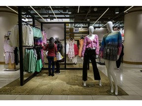 Shoppers inside a Nordstrom store in Toronto, Ontario, Canada, on Tuesday, March 21, 2023. Nordstrom will close its six Canadian department store locations and seven Nordstrom Rack shops, as CEO Erik Nordstrom said the company no longer sees a realistic path to profitability in the country,