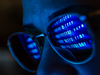 Computer code reflected in glasses