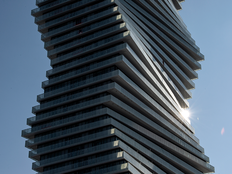 Balconies wrap around a condo tower