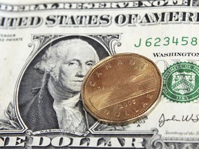 The Canadian dollar will take a hit as the gap widens between the rates of the Bank of Canada and the U.S. Federal Reserve.