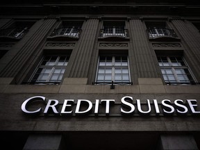 UBS Group AG agreed to buy Credit Suisse Group AG in a historic, government-brokered deal.