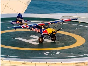 Pilot successfully lands a fixed wing Carbon Cub aircraft on one of the world's most iconic buildings, the Burj Al Arab hotel, in Dubai, UAE