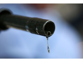 Gasoline drips out of a fuel nozzle. Photographer: Bloomberg Creative Photos/Bloomberg Creative Collection