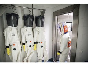 Biosafety-Level 4, or BSL-4, are labs in which workers wear moonsuits and handle dangerous pathogens, monitored by highly sophisticated security systems. Photographer: Akos Stiller/Bloomberg
