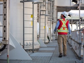 A worker at the LNG Canada site in Kitimat, B.C.