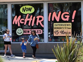 A McDonald's advertising it's hiring in California.