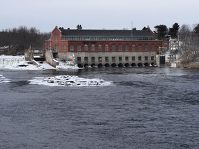 FILE- In this Jan. 19, 2019 file photo, the Brookfield Renewable hydroelectric facility stands at the Milford Dam on the Penobscot River in Milford, Maine. A group of environmental organizations and a Native American tribe charged Monday, March 6, 2023 that the operator of a Maine dam isn't fulfilling its obligation to protect the last remaining river run Atlantic salmon in the country.