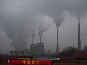 Smoke belching from a coal-fuelled power station near Datong, in China's northern Shanxi province.