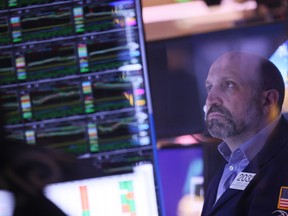 Traders working on the floor of the New York Stock Exchange.