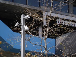 File - Security cameras are seen at the TikTok Inc. building in Culver City, Calif., Friday, March 17, 2023. The battle between the U.S. and China over TikTok comes to a head on Thursday when the social media platform's CEO testifies before Congressional lawmakers.