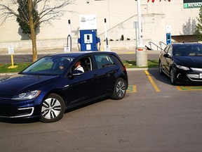 A driver backs a Volkswagen e-Golf into a parking spot at Lansdowne Mall in Peterborough, Ont. on Sunday June 17, 2018. Volkswagen has announced it plans to build an electric vehicle battery plant in St. Thomas, in southwestern Ontario.THE CANADIAN PRESS/Doug Ives