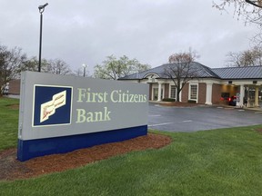 A First Citizens Bank sign is seen in Durham, North Carolina, on Monday March 27, 2023. North Carolina-based First Citizens will buy Silicon Valley Bank, the tech industry-focused financial institution that collapsed earlier this month.