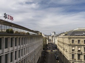 A general view shows the headquarters of the Swiss bank Credit Suisse, right, and UBS, left, at Paradeplatz in Zurich, Switzerland, Saturday, March 18, 2023.