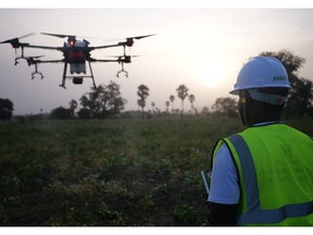 Employee of Zayed Sustainability Prize winner, Okuafo Foundation, demonstrates how to use a drone to optimise agricultural production