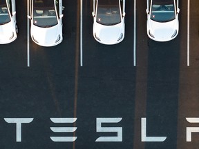 Cars parked at the Tesla Fremont Factory in Fremont, Calif.