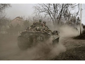 Ukrainian servicemen on the front line near Bakhmut. Photographer: Aris Messinis/AFP/Getty Images