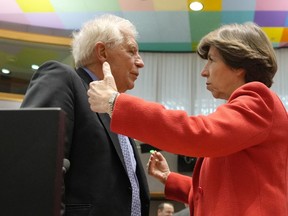 European Union foreign policy chief Josep Borrell, left, speaks with France's Foreign Minister Catherine Colonna during a meeting of EU foreign ministers at the European Council building in Brussels on Monday, March 20, 2023. European Union foreign ministers on Monday will discuss the situation in Ukraine and Tunisia.