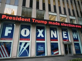FILE - A headline about President Donald Trump is displayed outside Fox News studios in New York on Nov. 28, 2018.
