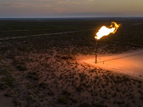 A gas flare in a field near Mentone, Texas. Photographer: Bronte Wittpenn/Bloomberg