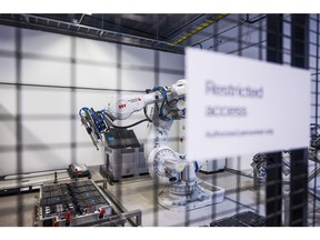 A robotic arm dismantles battery packs at the NorthVolt AB Labs research and development center in Vasteras, Sweden, on Tuesday, Feb. 15, 2022. Sweden's Northvolt is leading an effort to forge a regional champion that can beat rivals from Asia.