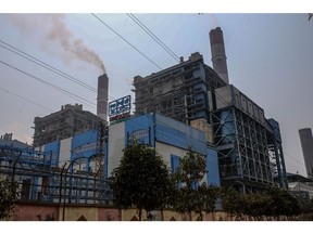 The coal-fired NTPC Simhadri thermal power plant in the outskirts of Visakhapatnam, Andhra Pradesh, India, on Sunday, March 20, 2022. India, the world's third biggest emitter of greenhouse gases, plans to more than triple its clean-energy capacity by the end of the decade and zero out emissions by 2070. Photographer: Dhiraj Singh/Bloomberg