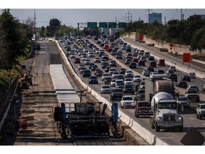 Traffic on Highway 50 in Sacramento, California, U.S., on Thursday, March 24, 2022. California Governor Gavin Newsom is proposing to send car owners $400 debit cards and partially pause gasoline taxes to address high gas prices.
