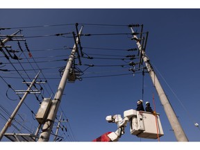 Korea Electric Power Corp. (Kepco) engineers carry out maintenance on power cables at a substation in Naju, South Jeolla Province, South Korea, on Monday, Nov. 7, 2022. Kepco is scheduled to announce its earnings figures next week.