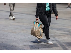 A shopper carries a Primark branded bag in Barcelona, Spain, on Thursday, April 13, 2023. Spanish inflation figures are reported on April 14. Photographer: Angel Garcia/Bloomberg