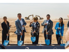 Vicki Hollub, center, and Richard Jackson, second right, during a groundbreaking on, April 28.