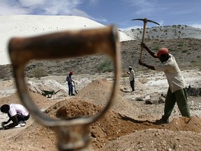 Artisanal miners work on the site of a disused tin mine in Uis, Namibia which is about to become part of the global race for lithium.
