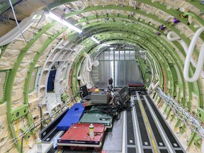 A view inside the fuselage of a Bombardier Challenger aircraft under construction is shown at Bombardier's Challenger manufacturing plant in Montreal, Wednesday, April 5, 2023.